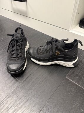 CHANEL Black Sneakers with White Quilted Sole and Gold CC